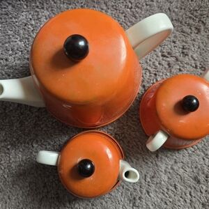 Vintage Geoffrey Beene for Swid Powell orange tea set